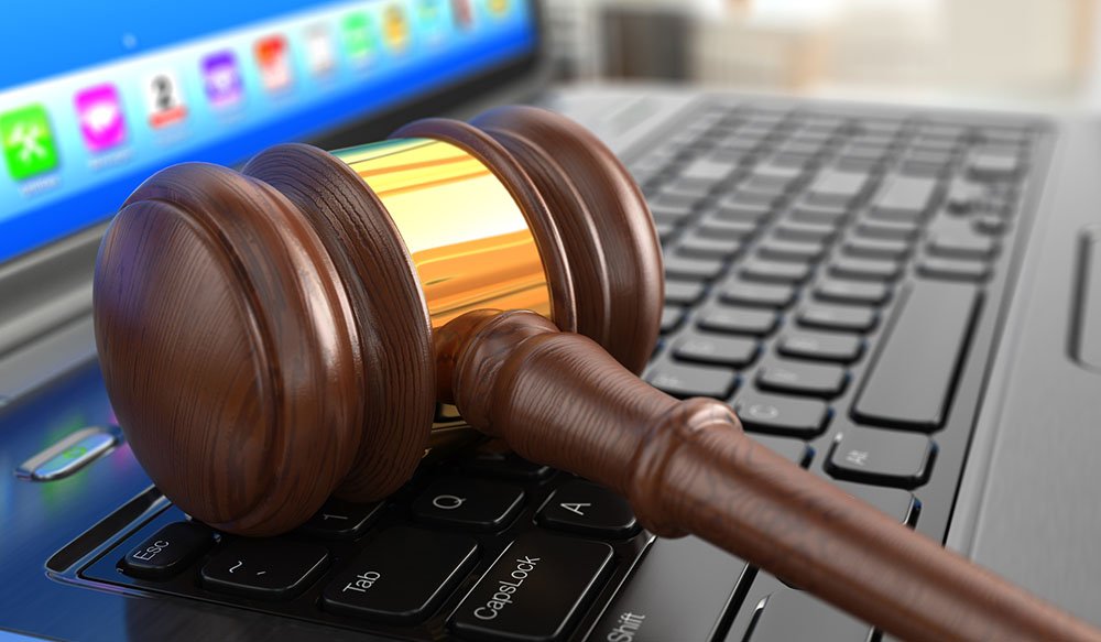 stockphotoscom-6281383 Lawyers Gavel on laptop-small