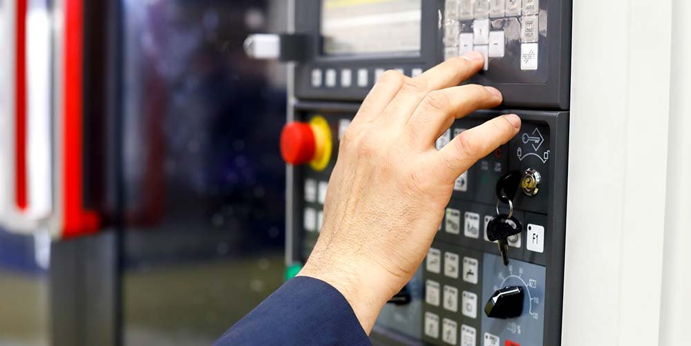 stockphotoscom-832831 Operator working with CNC machining-small